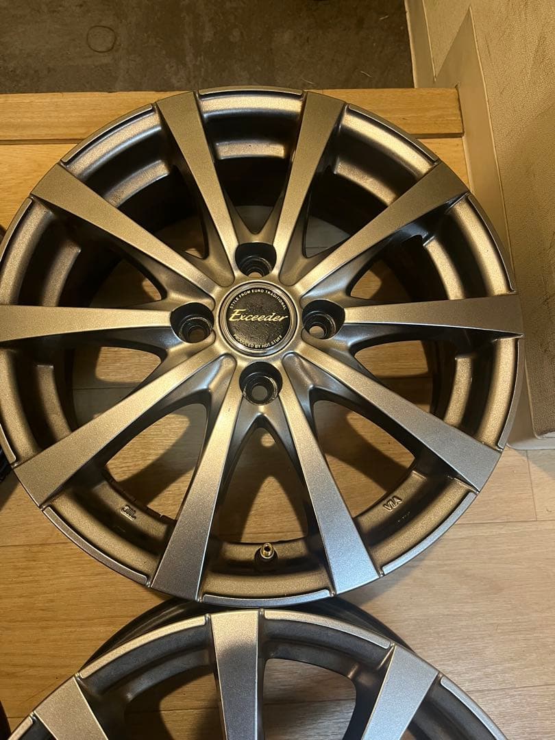 送料込！ホットスタッフ5.5J4H100の15インチ アルミホイールガンメタ4枚
