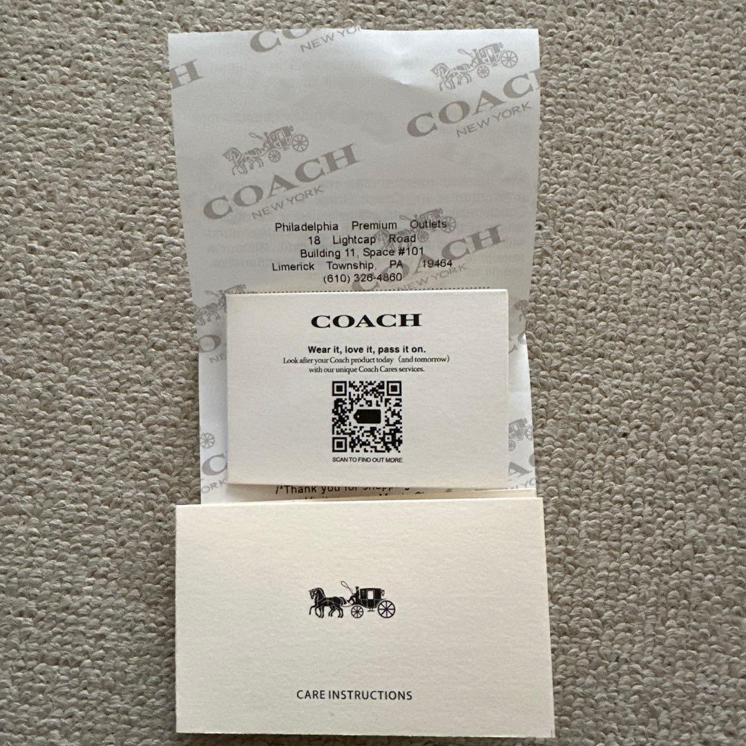 ★新品タグ付★ COACH 二つ折り財布 ブラック 星柄