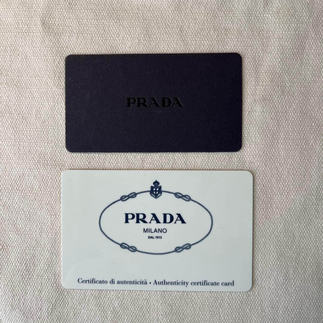 PRADA プラダ 二つ折り財布 サフィアーノ メタル色