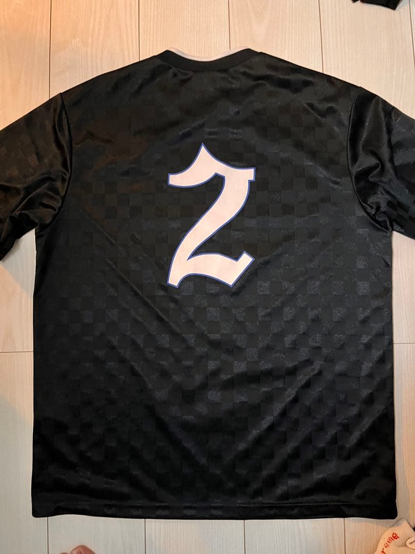 トップス supreme umbro