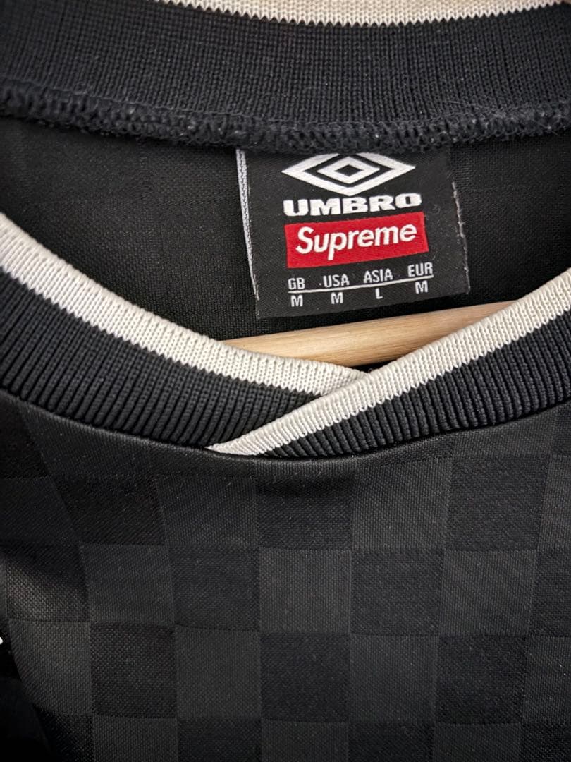 トップス supreme umbro