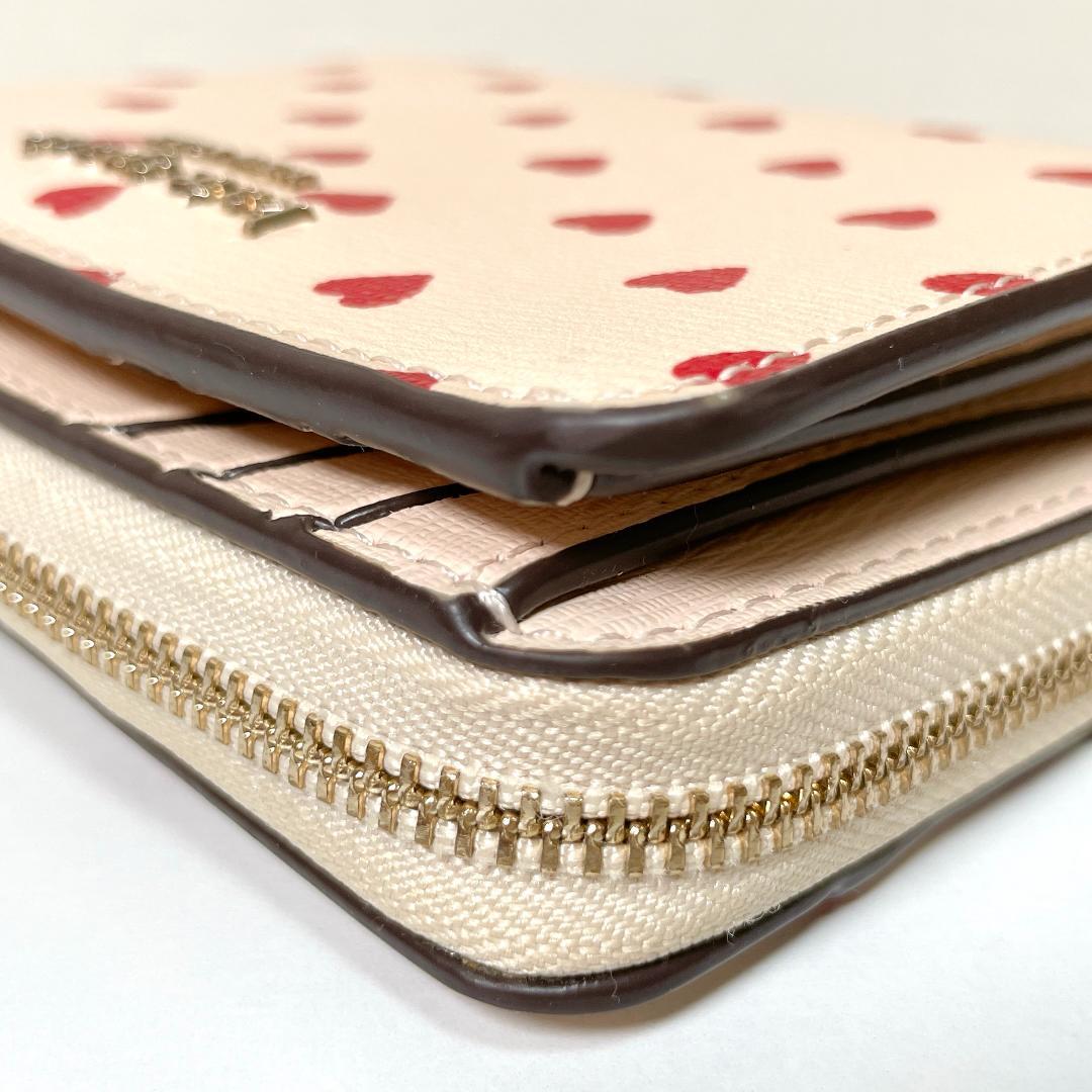 キュートなハート柄❤️kate spade スペンサー　二つ折り財布　ハート