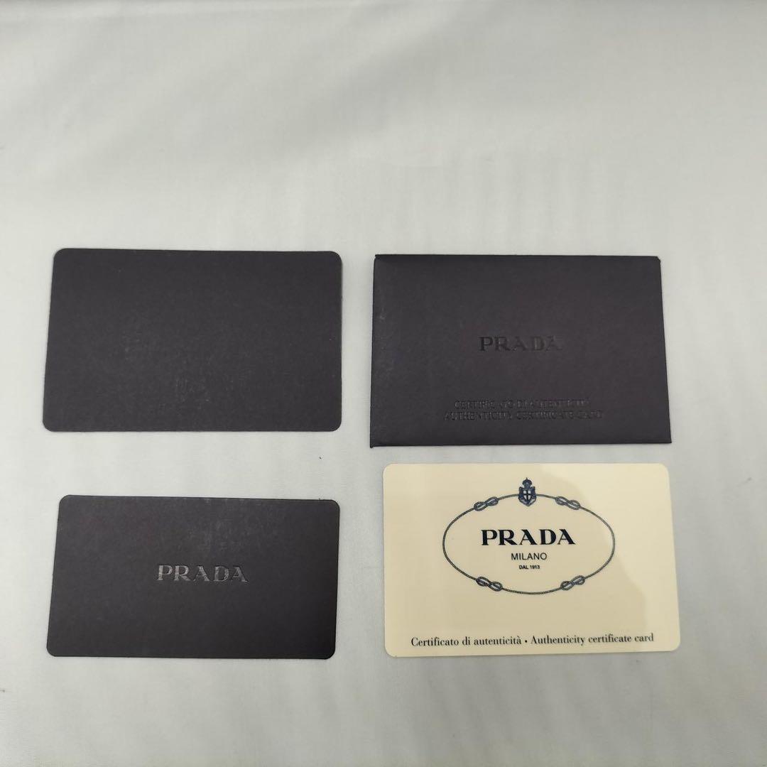 【美品】 PRADA プラダ　サフィアーノ　三つ折り財布　パープル　三角ロゴ
