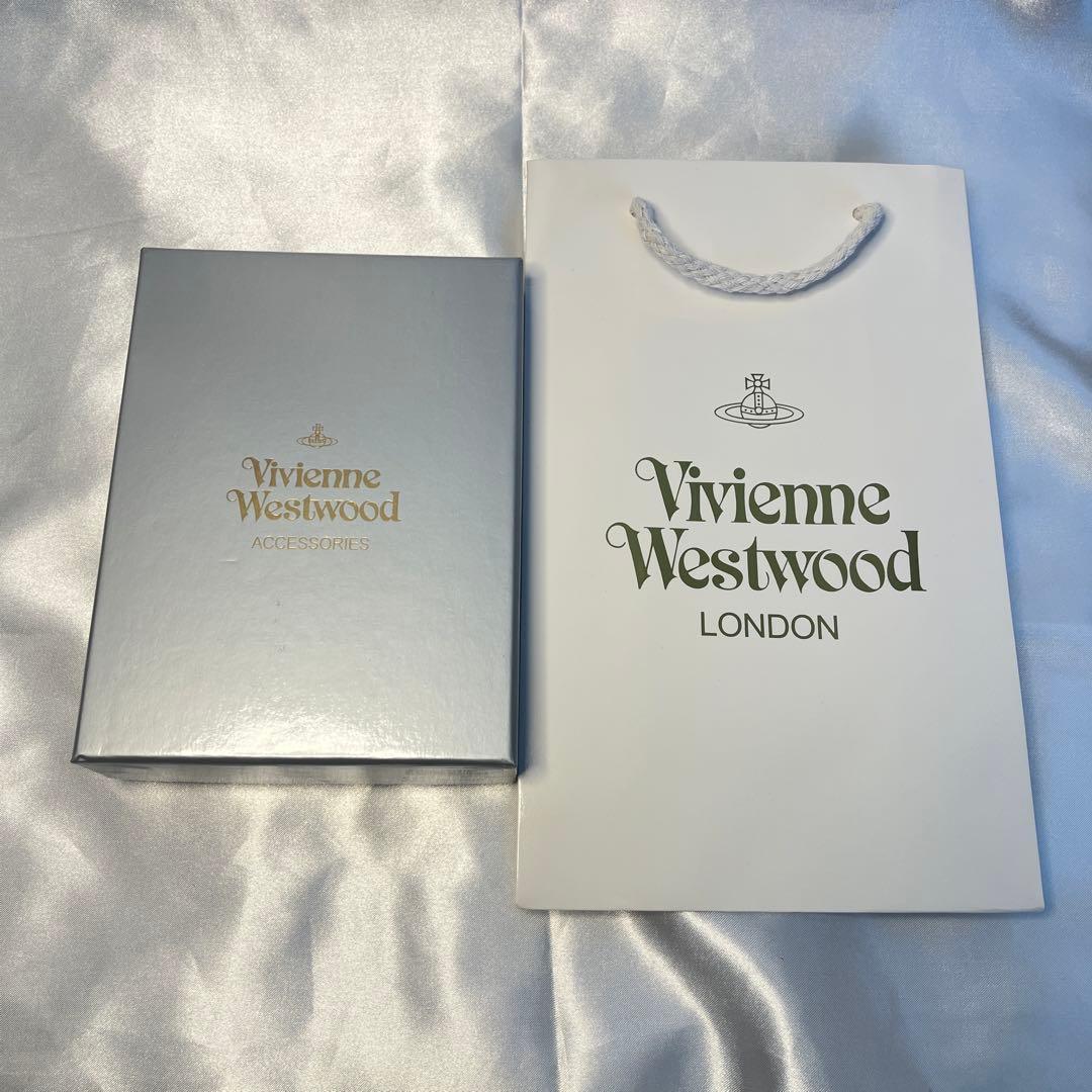 新品 Vivienne Westwood 黒ヴィヴィアン柄 三つ折り財布 大人気