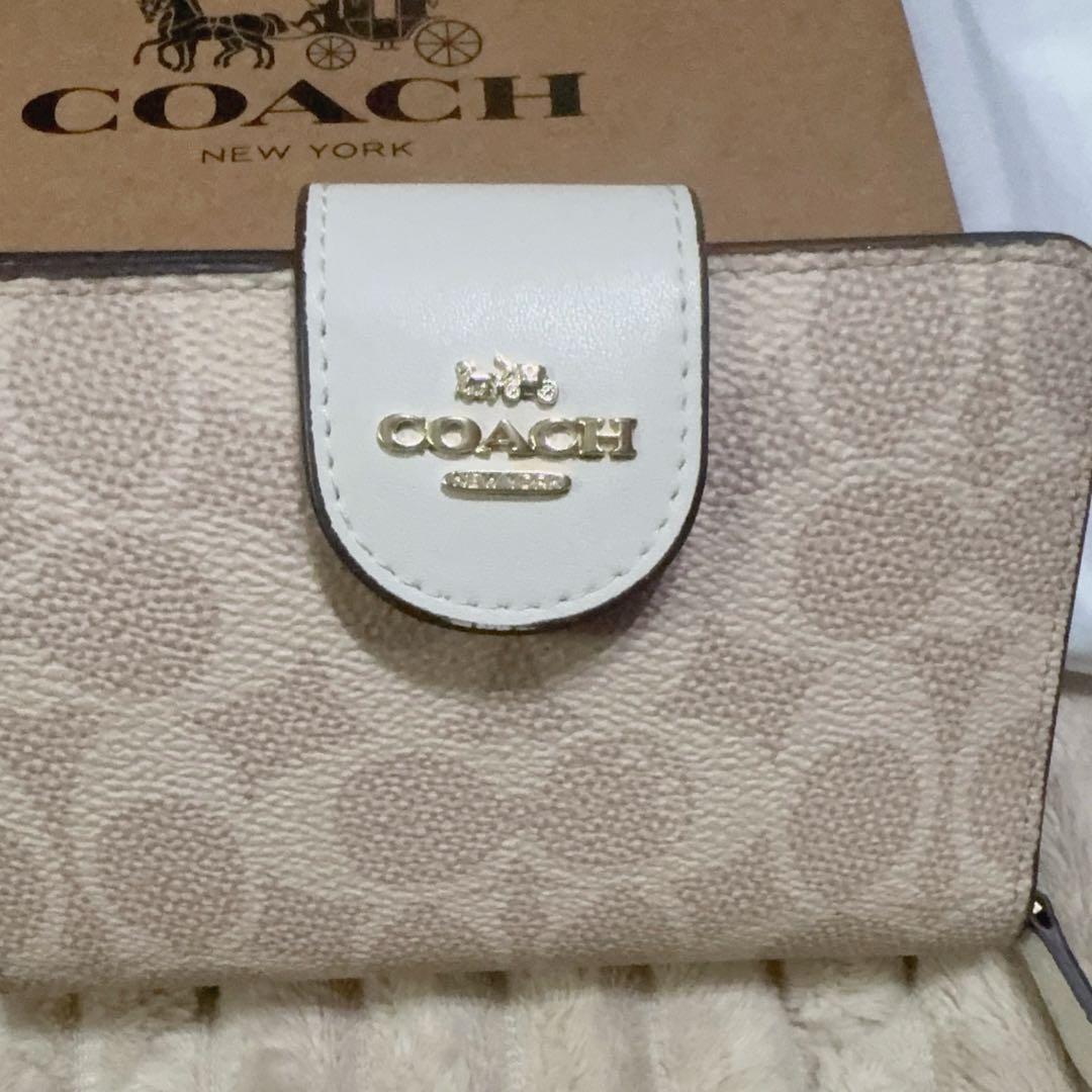 『中古』COACH ベージュ 二つ折り財布