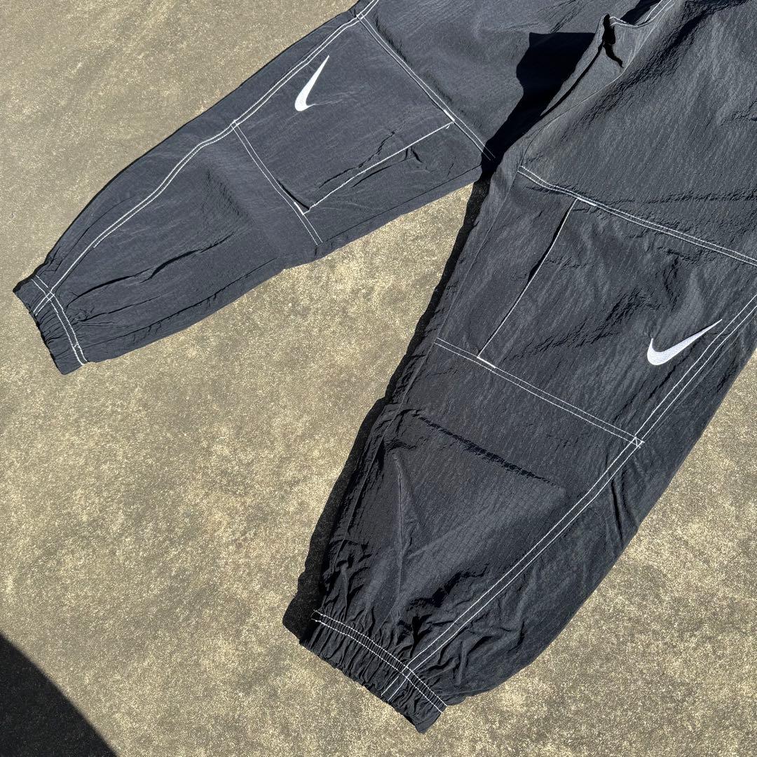 たっくーや　NIKE ナイキ スウッシュステッチ トラックパンツ 黒 M