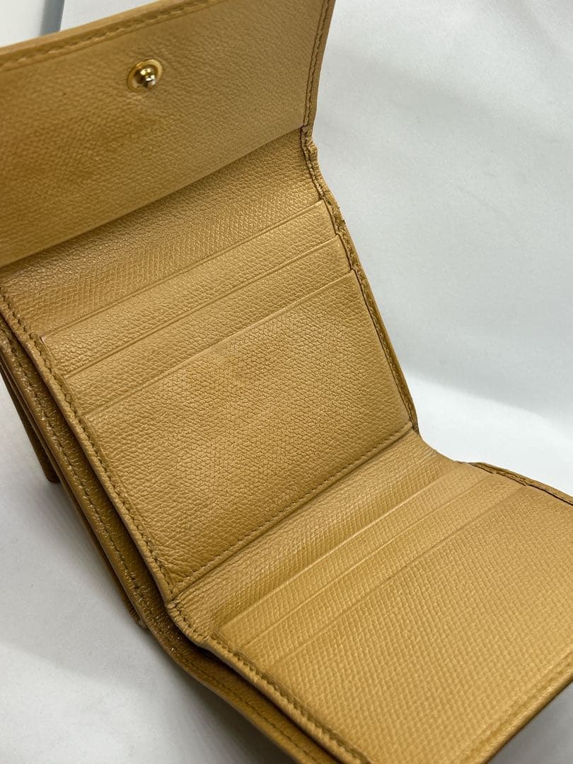 良品✨　シャネル　シリアル有　折り財布　イエロー　レザー　ココボタン/714