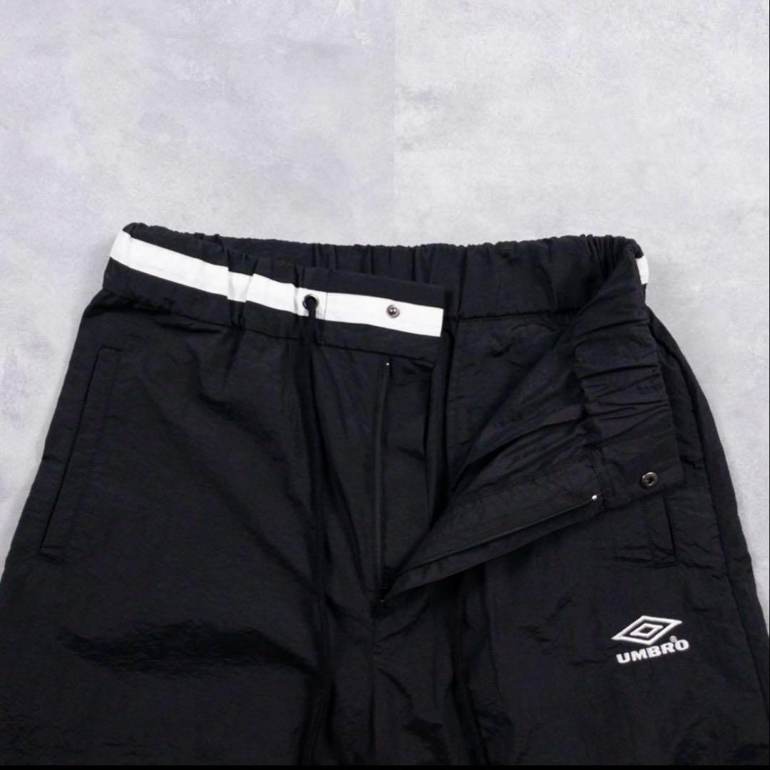 アンブロ ベルパー ムウトアール ナイロン トラックパンツ 黒 24SS 別注