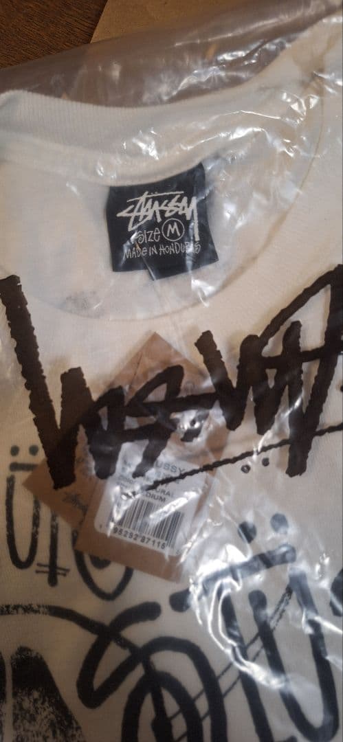 トップス STUSSY SKULLS TEE PIGMENT
