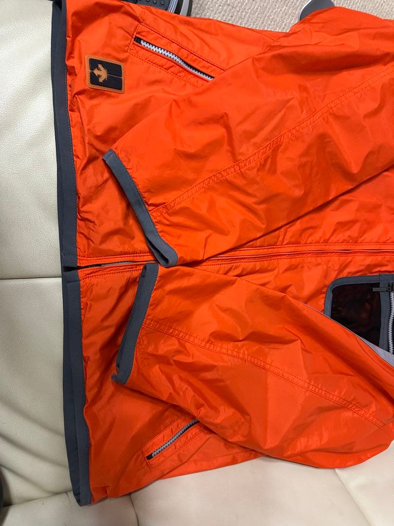 オレンジ スノーボードウェア メンズ