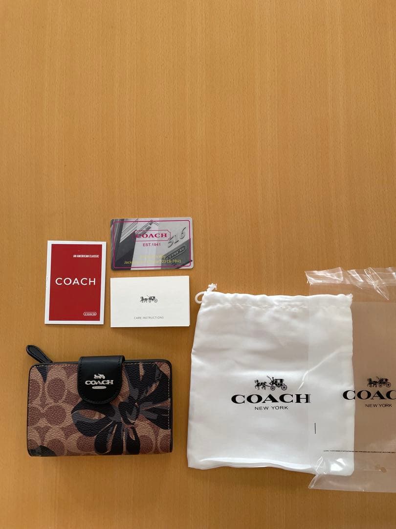 まい　COACH コーチ　二つ折り財布　リボン