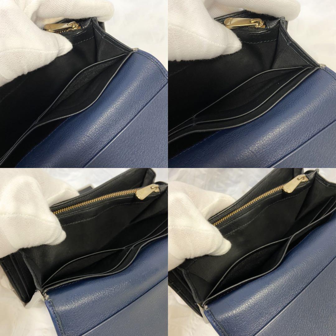 【良品】Salvatore Ferragamo 二つ折り財布 ネイビー 金 金具