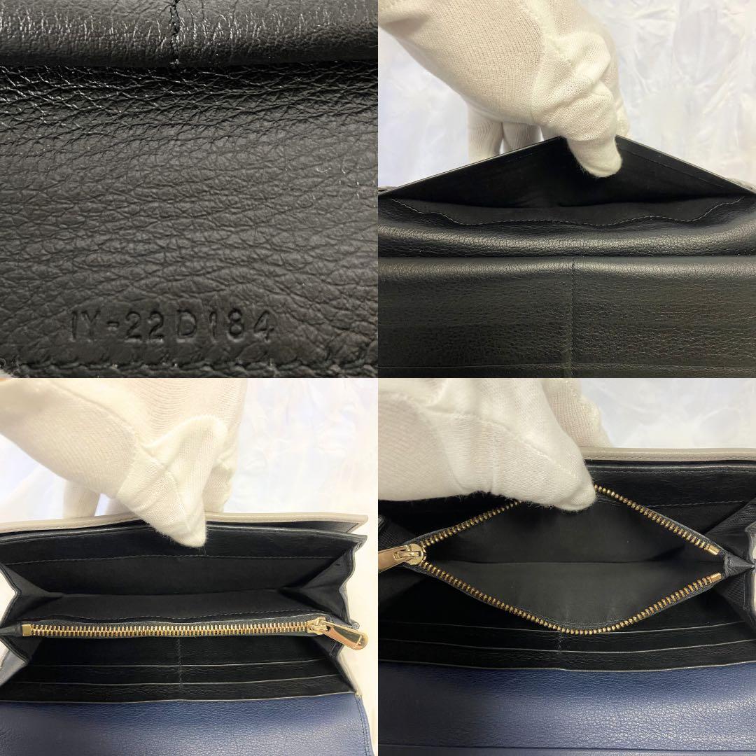 【良品】Salvatore Ferragamo 二つ折り財布 ネイビー 金 金具