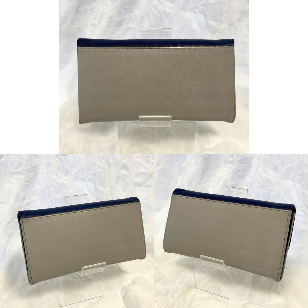 【良品】Salvatore Ferragamo 二つ折り財布 ネイビー 金 金具