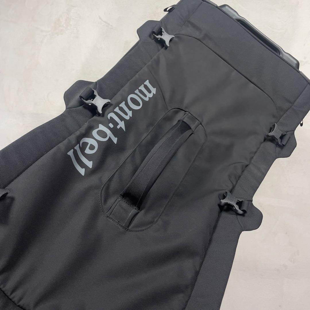 美品 モンベル ウィリーダッフル100 黒 キャスター付きダッフルバッグ 大容量