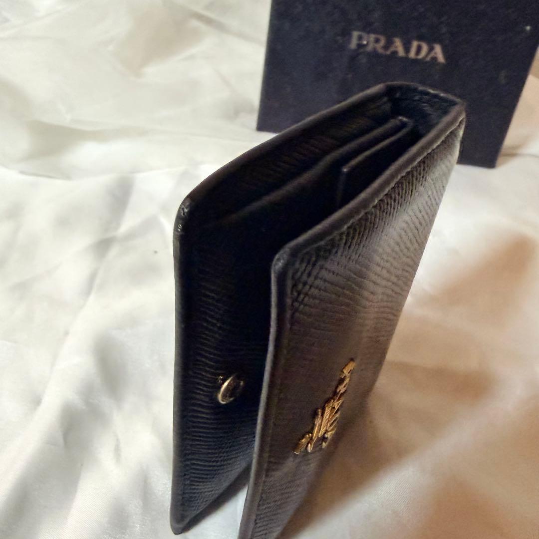 PRADA ブラック　サフィアーノレザー 二つ折り財布 箱付き