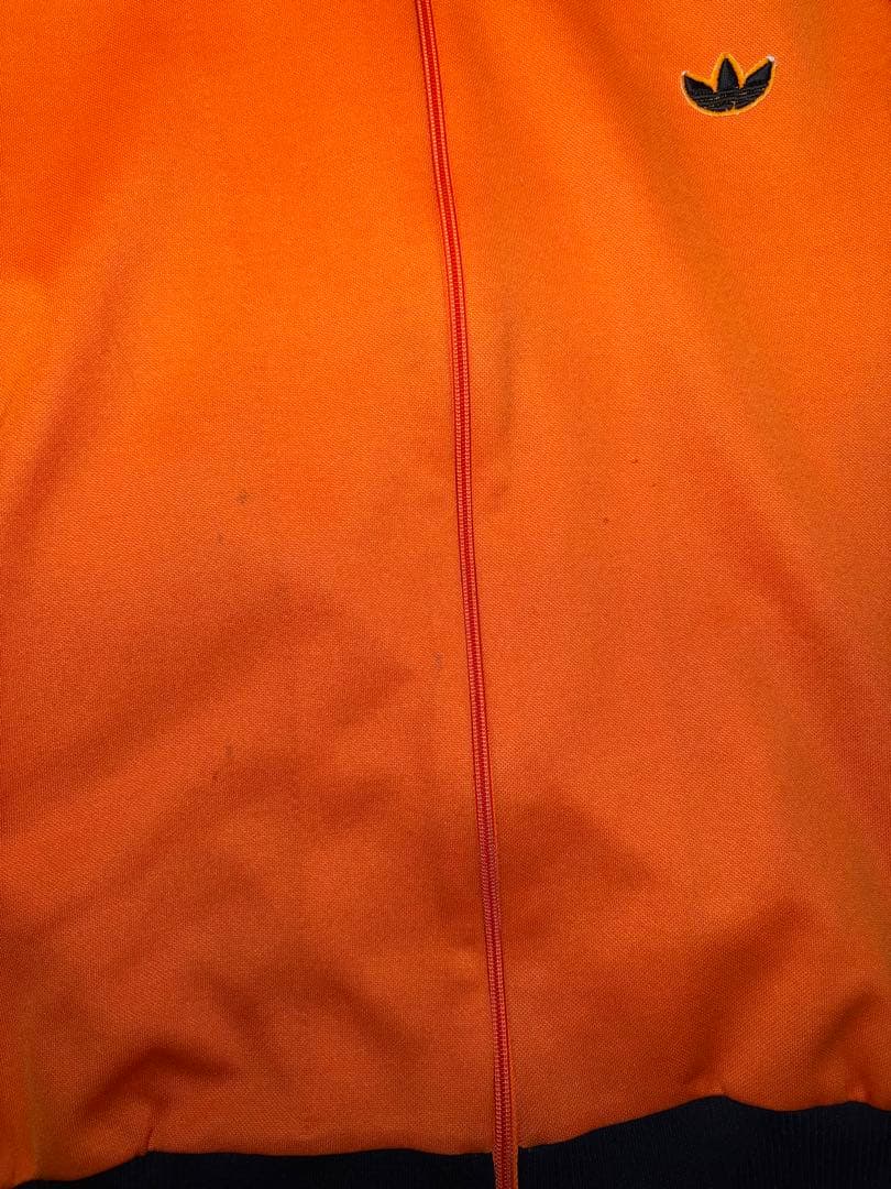 adidas トラックジャケット オレンジ