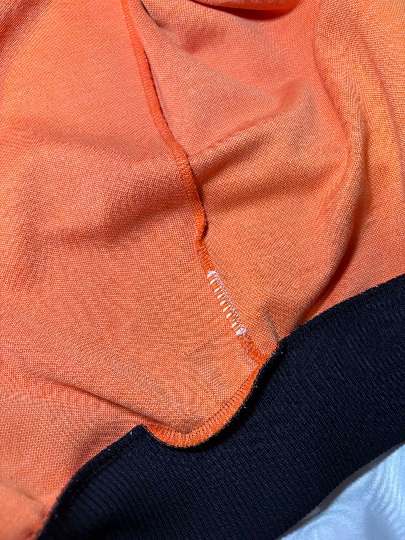 adidas トラックジャケット オレンジ