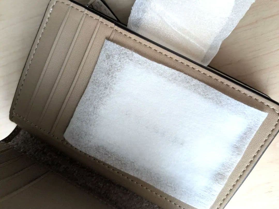 新品未使用＊コーチ花柄二つ折り財布＊フラワー＊本日限定価格お値下げ✨