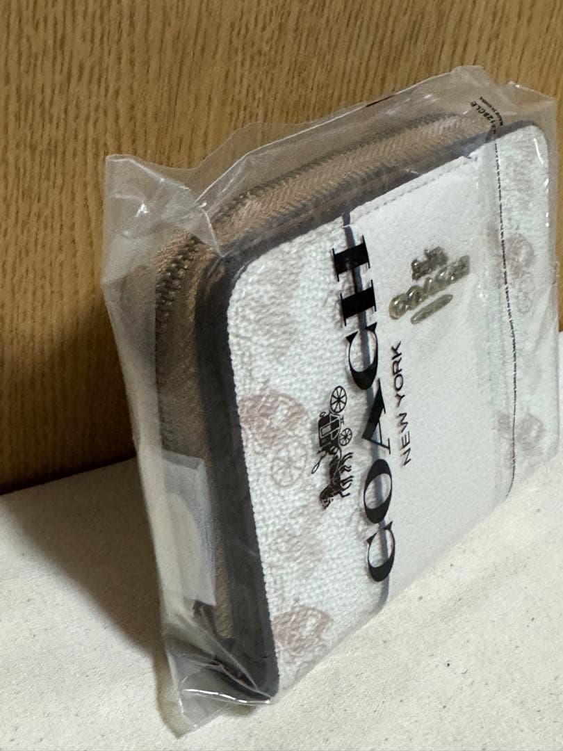 COACH 二つ折り財布 馬車柄