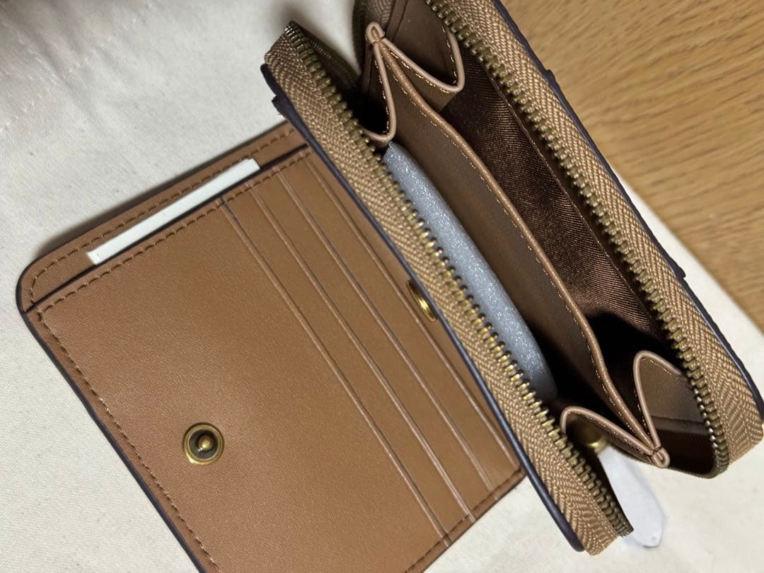 COACH 二つ折り財布 馬車柄