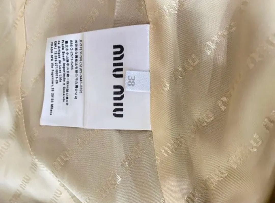 Miumiu のトレンチコート