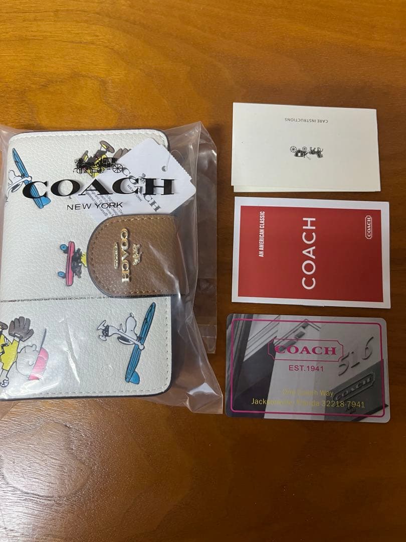 【新品未使用】COACH コーチ コラボ スヌーピー 二つ折財布