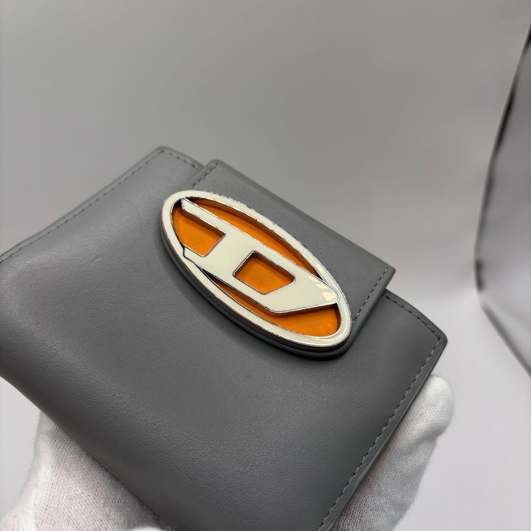 DIESEL 二つ折り財布　ブルー　オレンジ　1dr dロゴ　サークル　財布