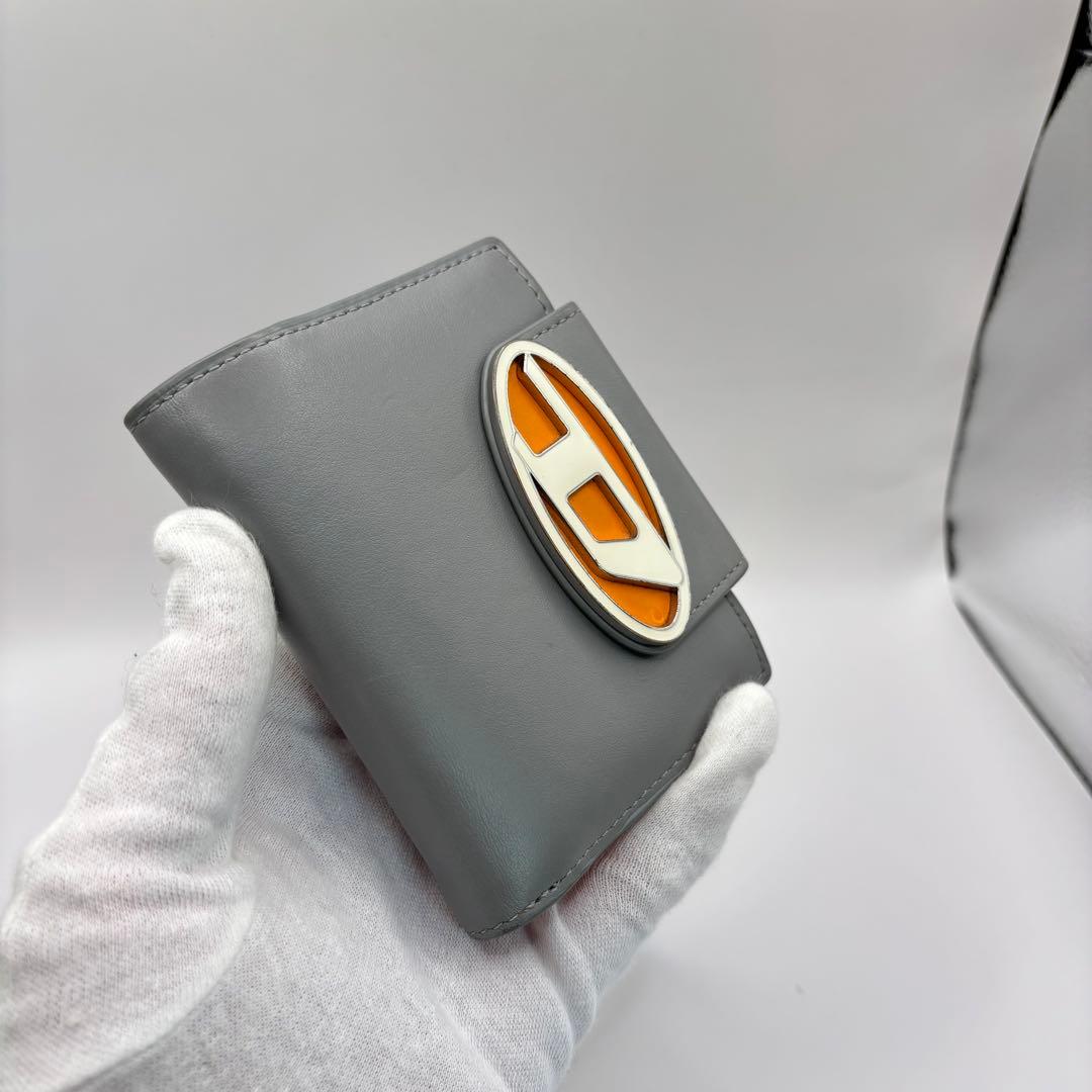 DIESEL 二つ折り財布　ブルー　オレンジ　1dr dロゴ　サークル　財布