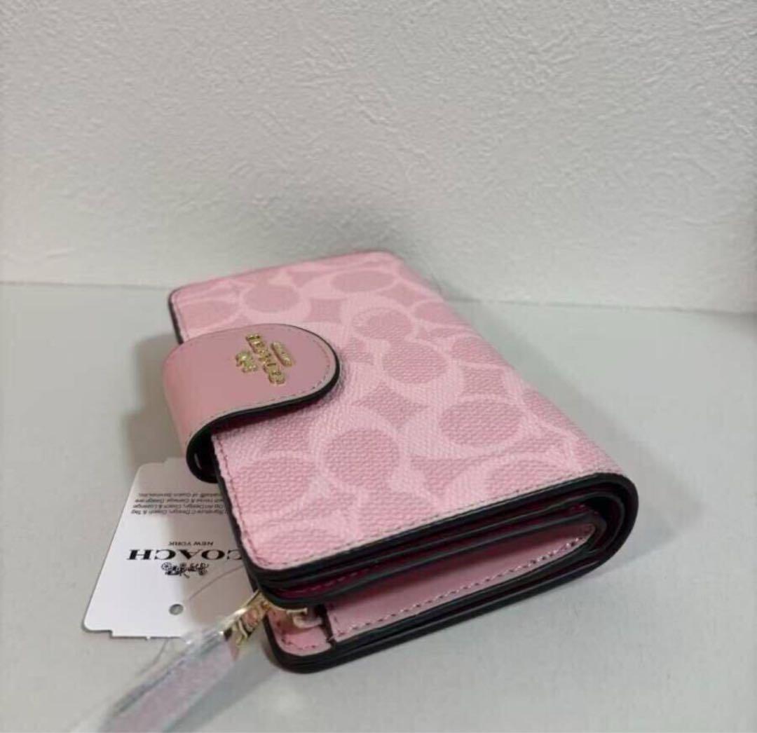 COACH 二つ折り財布　ピンク