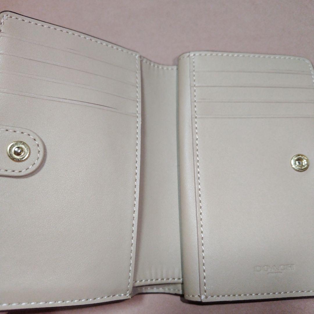 ありなページCOACH２つ折りがま口財布　花柄