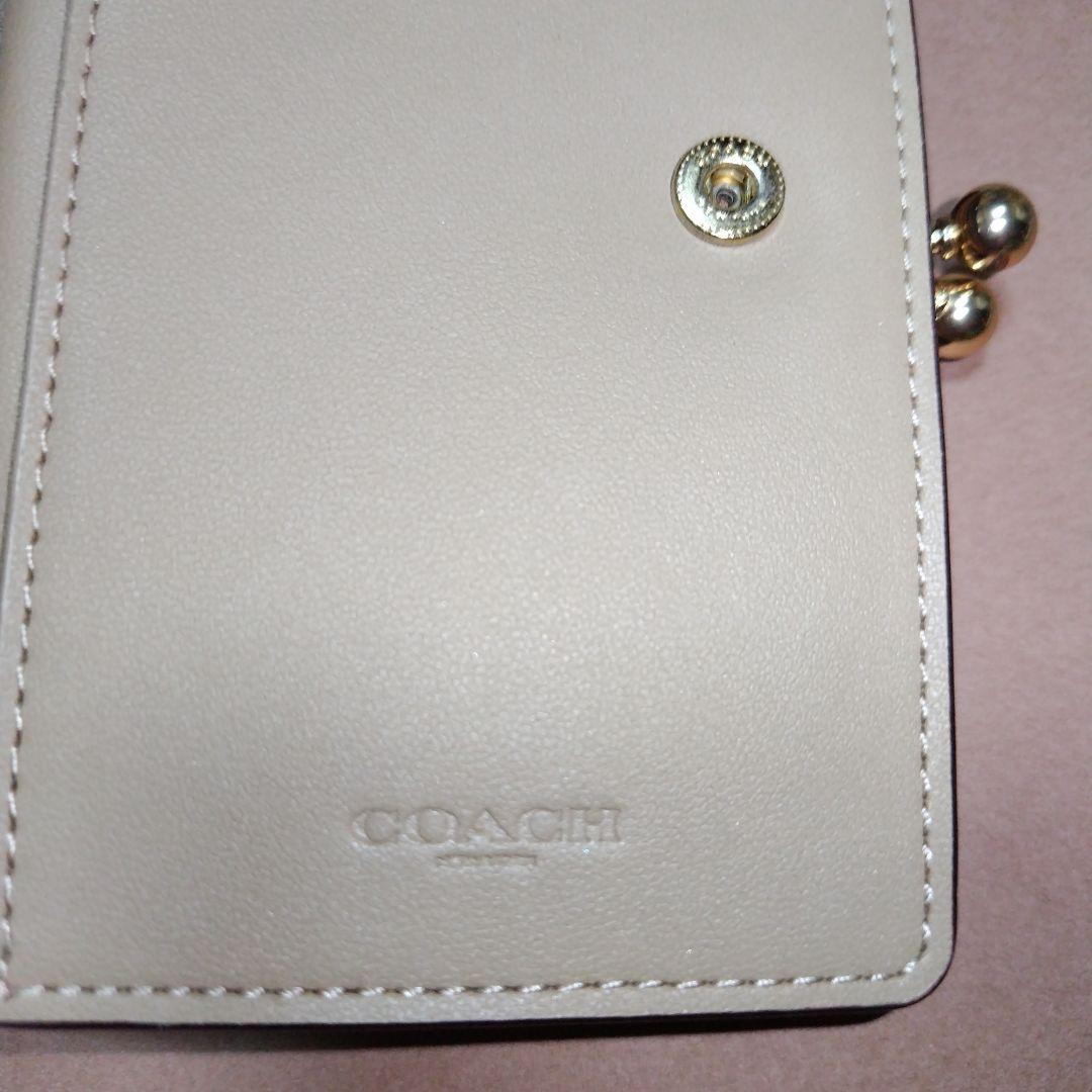 ありなページCOACH２つ折りがま口財布　花柄