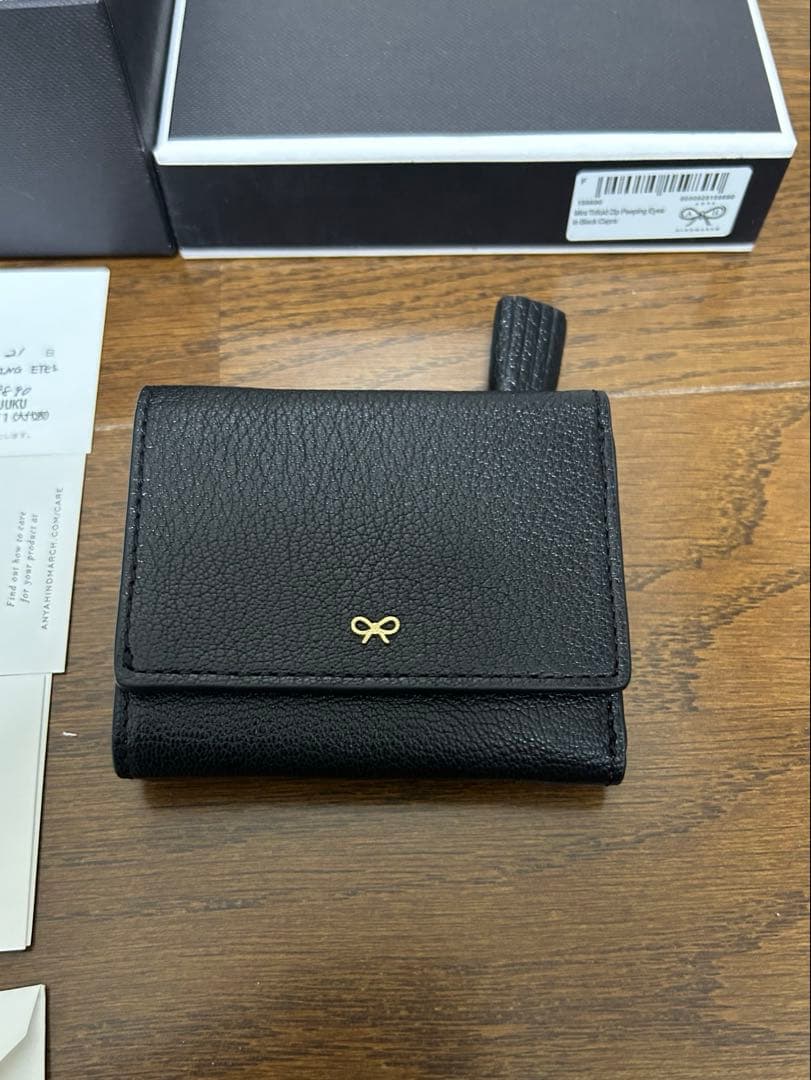 アニヤハインドマーチMini Trifold Zip Peeping Eyes