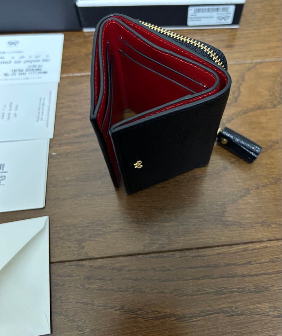 アニヤハインドマーチMini Trifold Zip Peeping Eyes