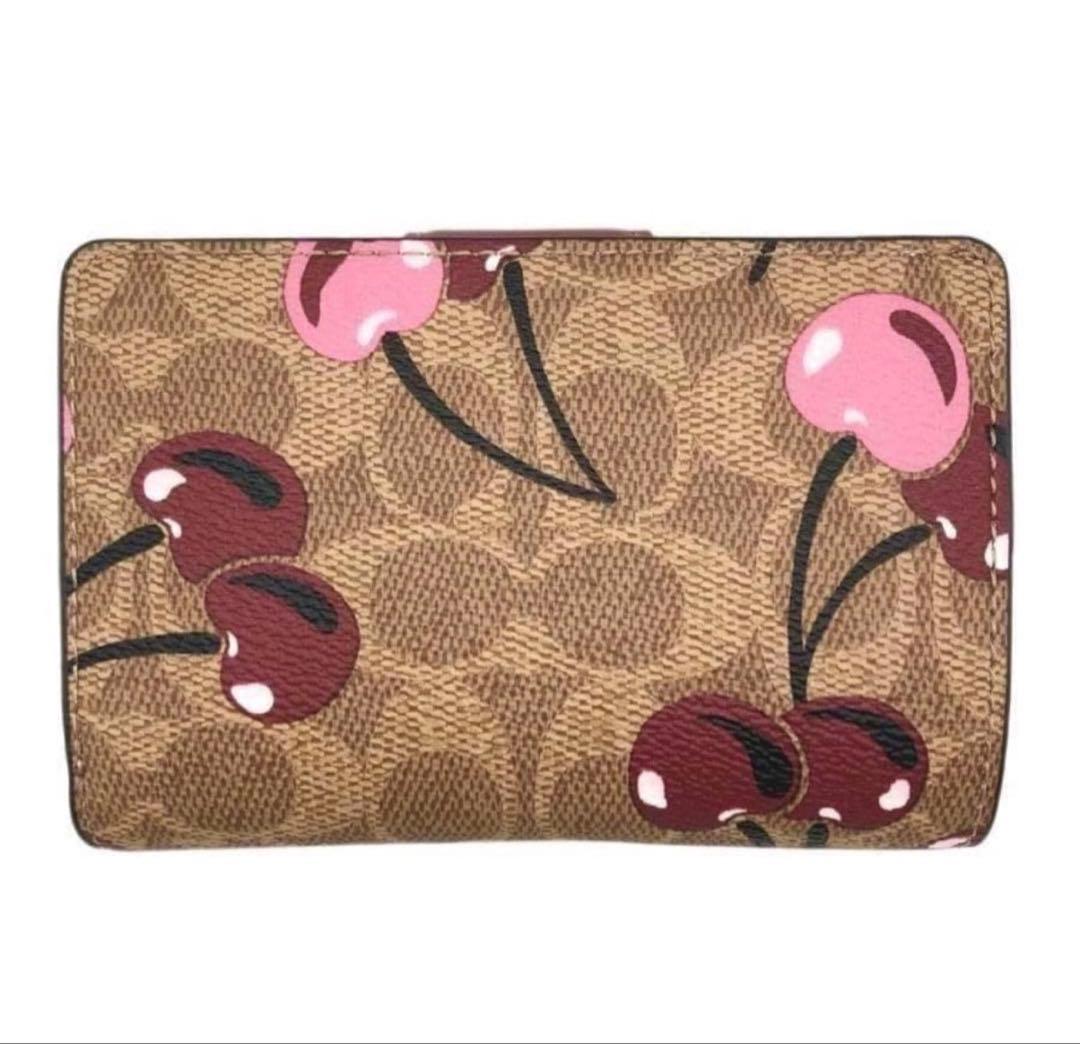 송*민様 人気のcoachコーチシグネチャーチェリープリントミディアム二つ折り財