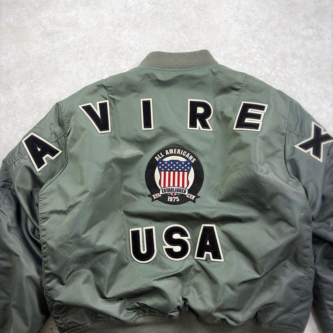希少　50周年限定　AVIREX 【XXL】MA-1 コマーシャルロゴ　地図裏地