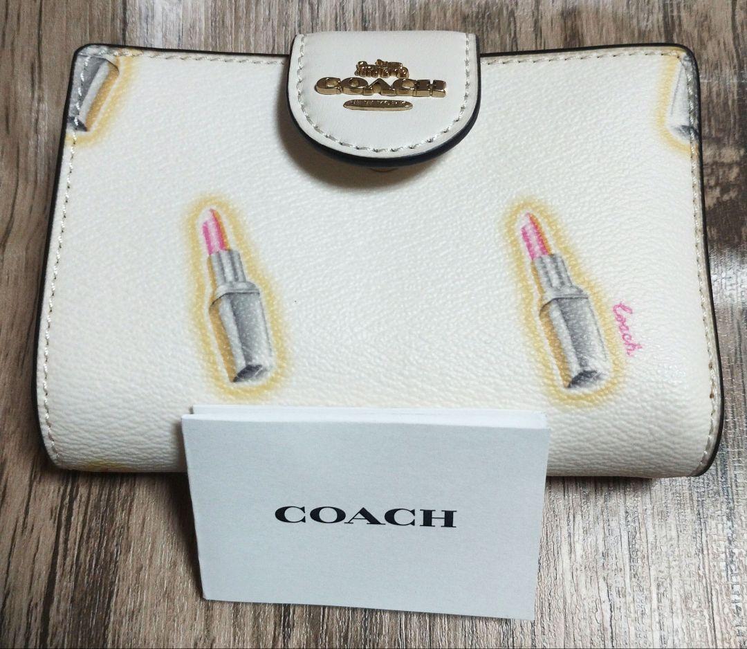 d*a様 【新品】COACH リップスティック柄 二つ折り財布