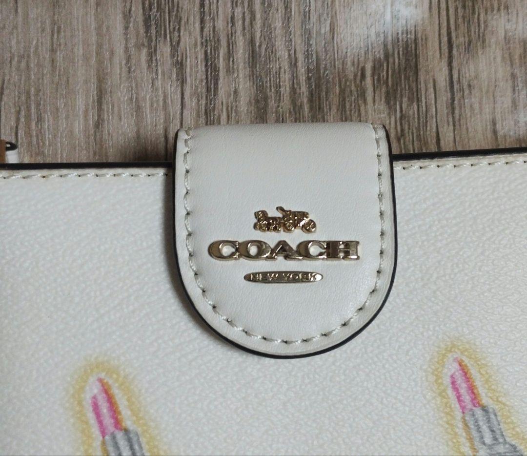 d*a様 【新品】COACH リップスティック柄 二つ折り財布