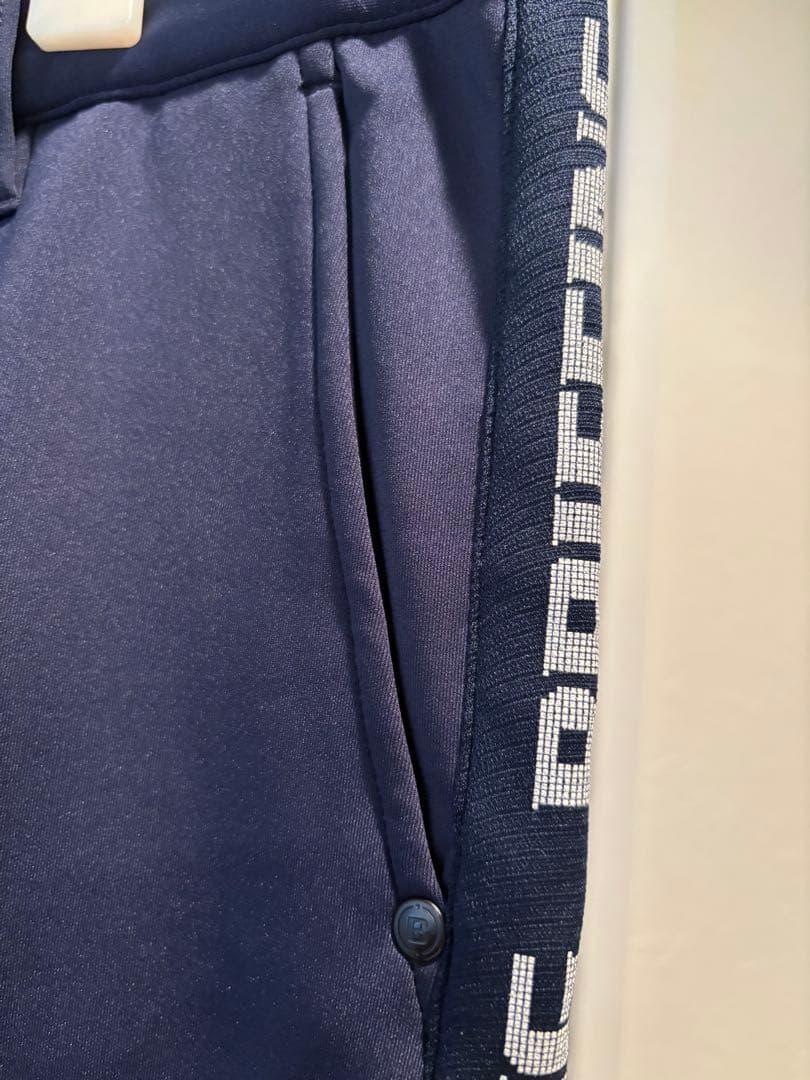 BRIEFING SIDE LOGO LINE SLIM PANTS ネイビー