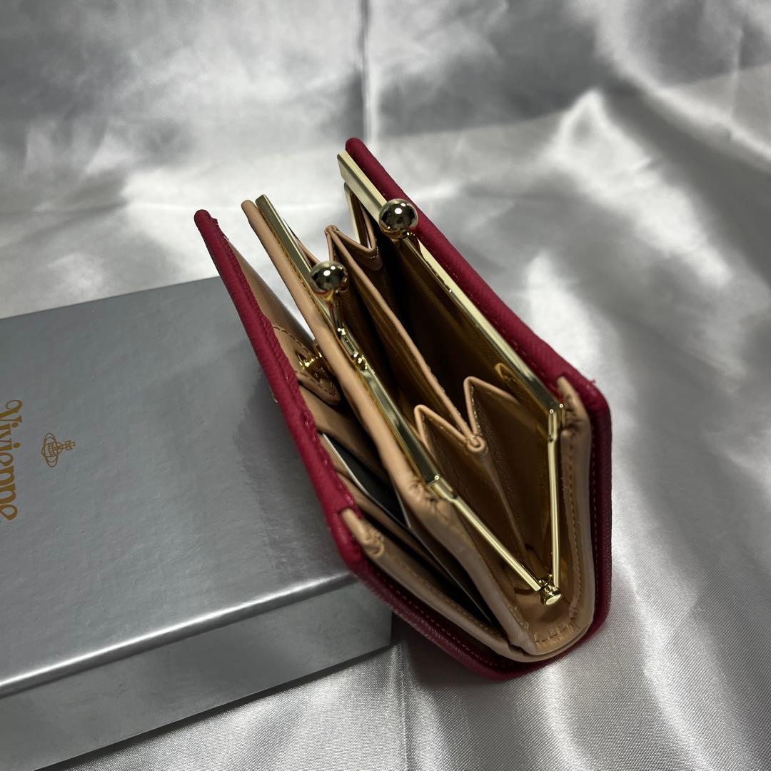 新品Vivienne Westwoodピーチ 蝶々留め 二つ折り財布 可愛い