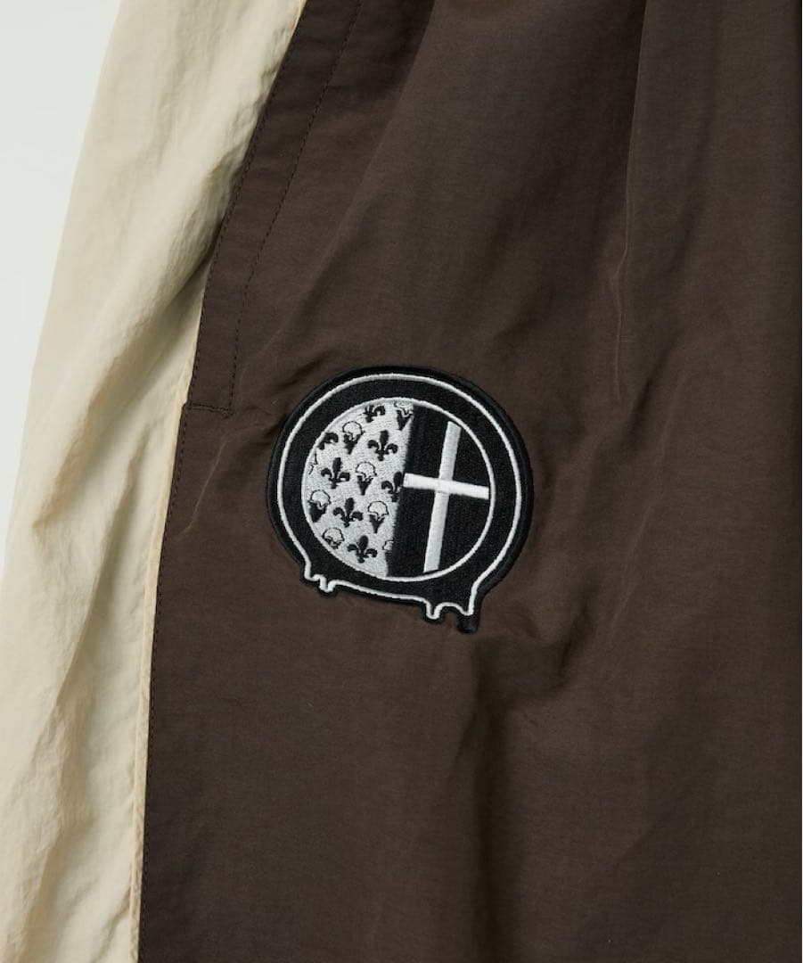 UMBRO go!go!vanillas ナイロントラックパンツ ブラウン