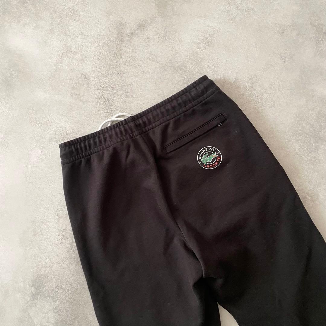 LACOSTE x AWAKE NY スウェットパンツ ブラック コラボ ロゴ