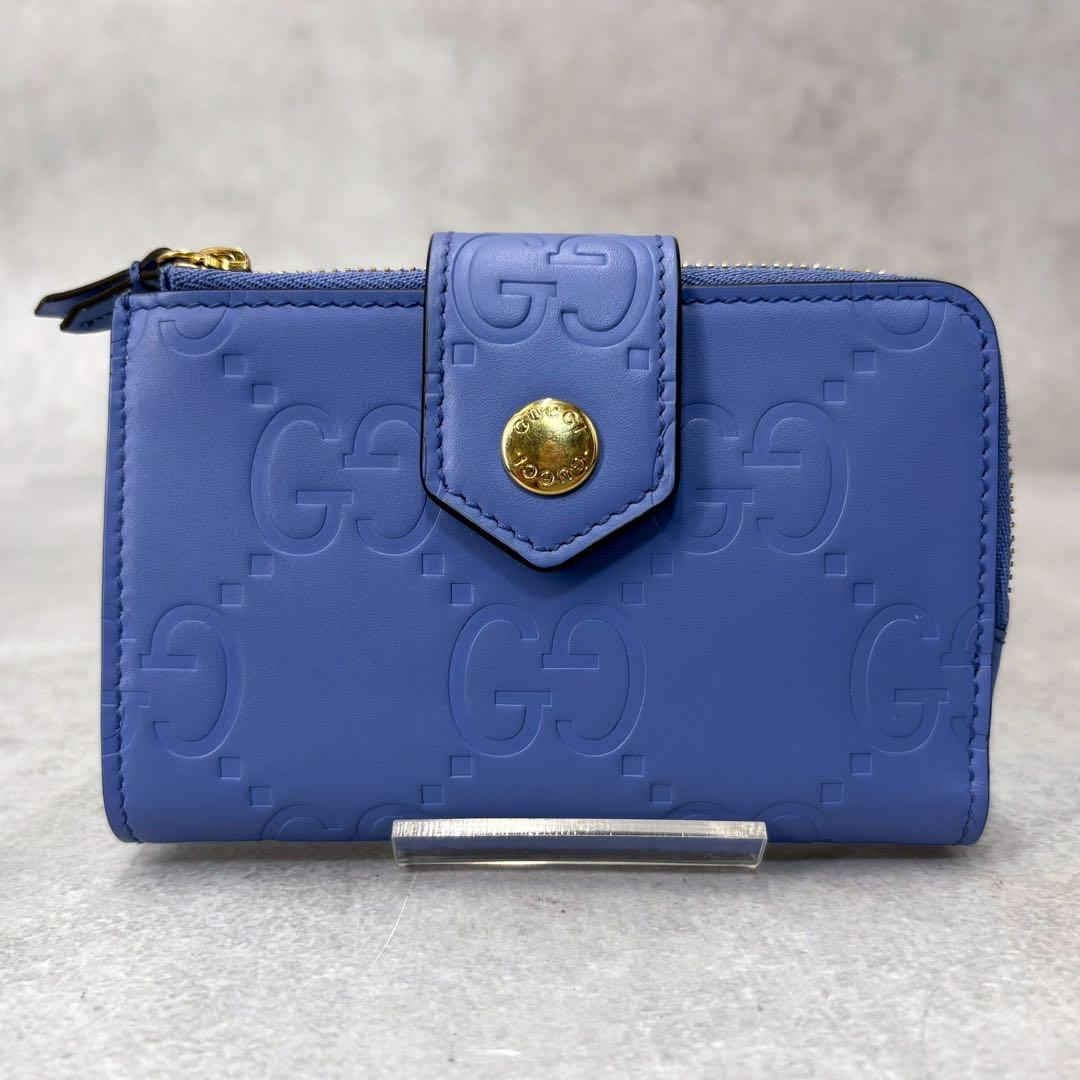 GUCCI GGエンボス ミディアムウォレット 二つ折り ミニ財布 ブルー