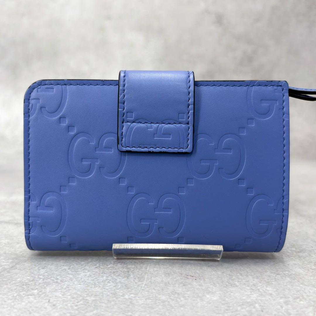 GUCCI GGエンボス ミディアムウォレット 二つ折り ミニ財布 ブルー
