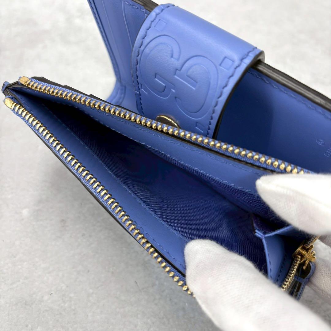 GUCCI GGエンボス ミディアムウォレット 二つ折り ミニ財布 ブルー