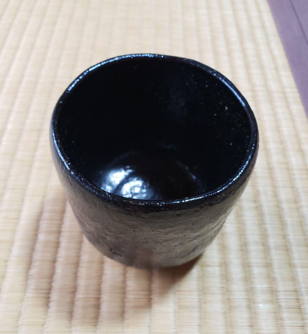 No186　古い 窯印８楽の黒楽筒茶碗