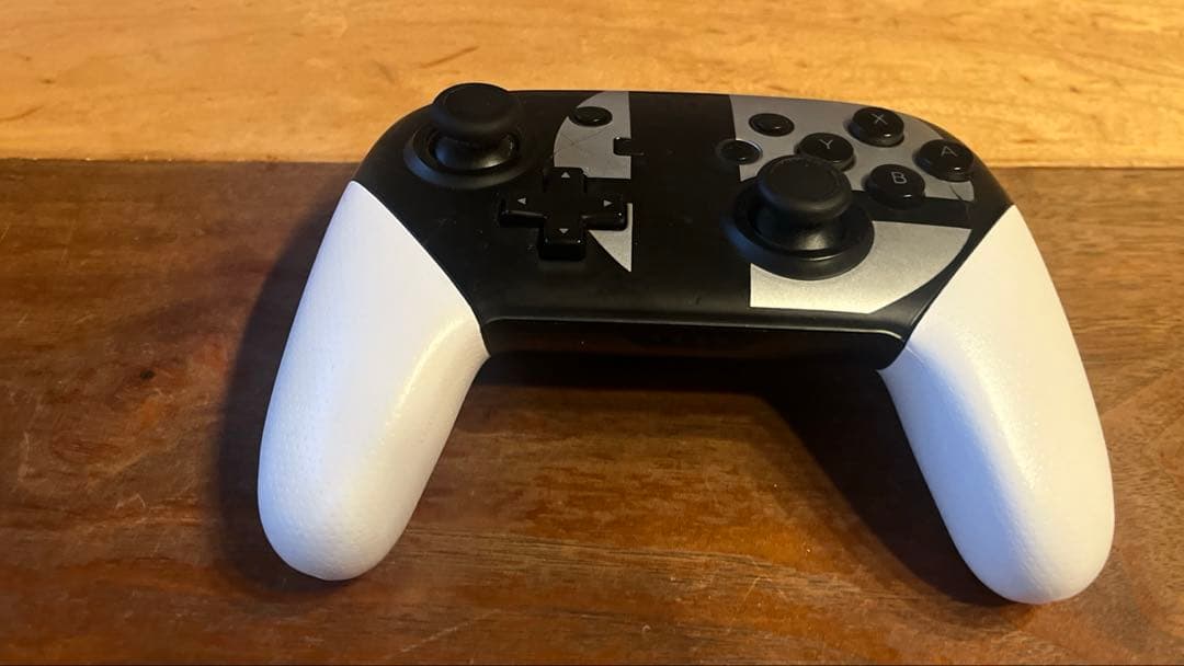 NintendoSwitchLight 黒色ジャンク品。コントローラー 作動可能