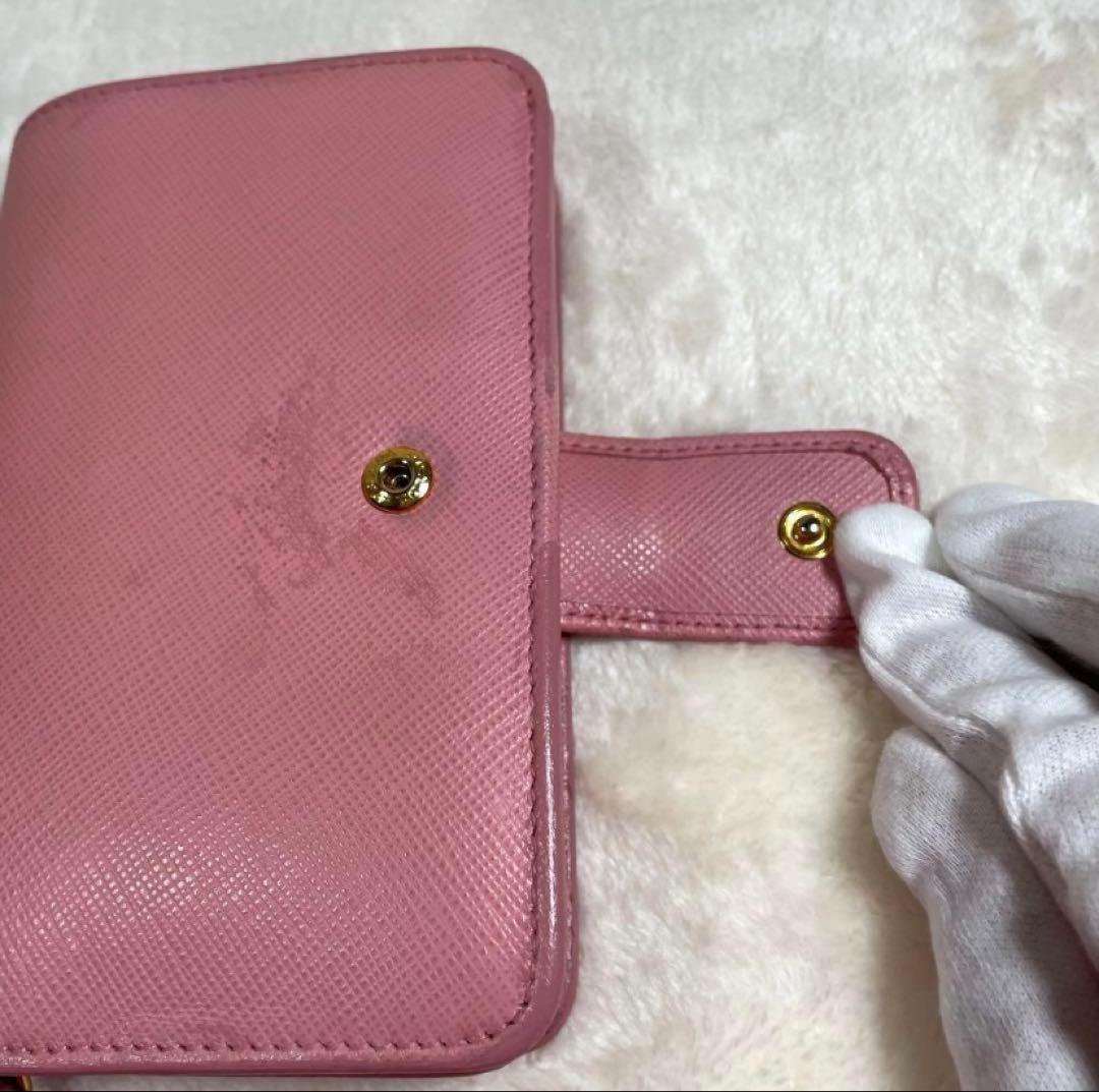 【人気】PRADA 二つ折り財布 ピンク ペオニアベルト サフィアーノ
