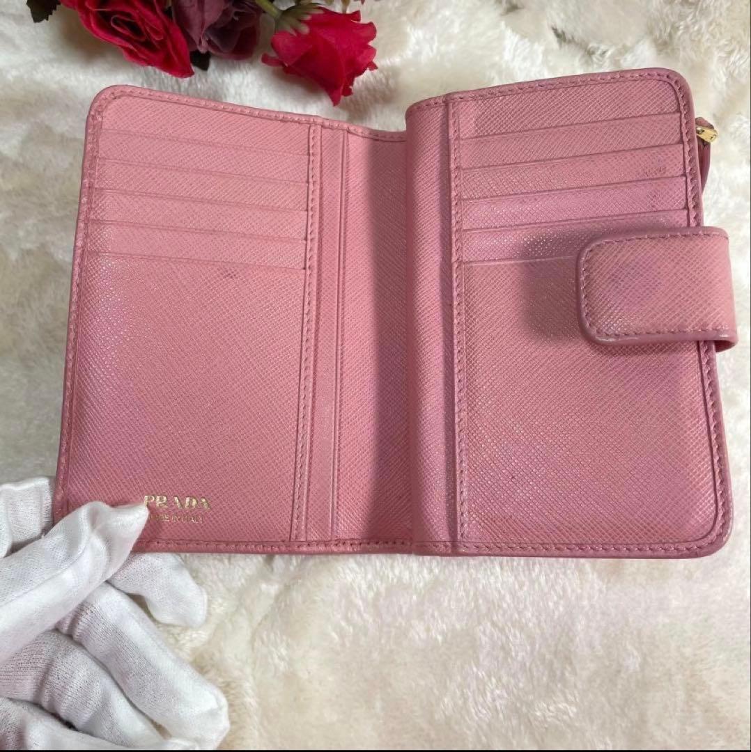 【人気】PRADA 二つ折り財布 ピンク ペオニアベルト サフィアーノ