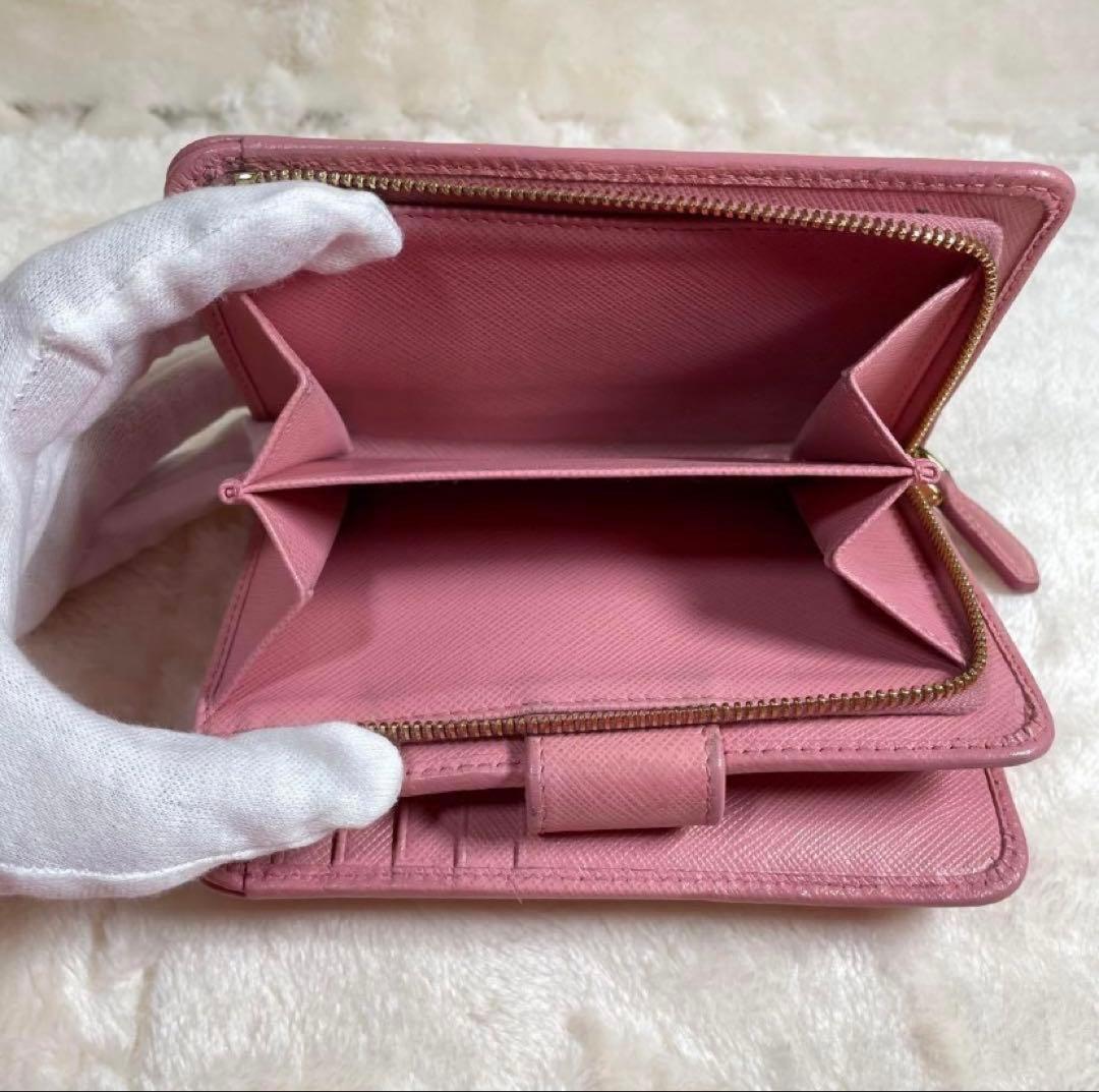 【人気】PRADA 二つ折り財布 ピンク ペオニアベルト サフィアーノ